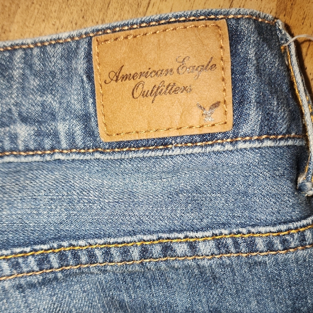 American Eagle Distressed Medium Wash Jean Shorts with Raw Edge - Picture 8 of 8